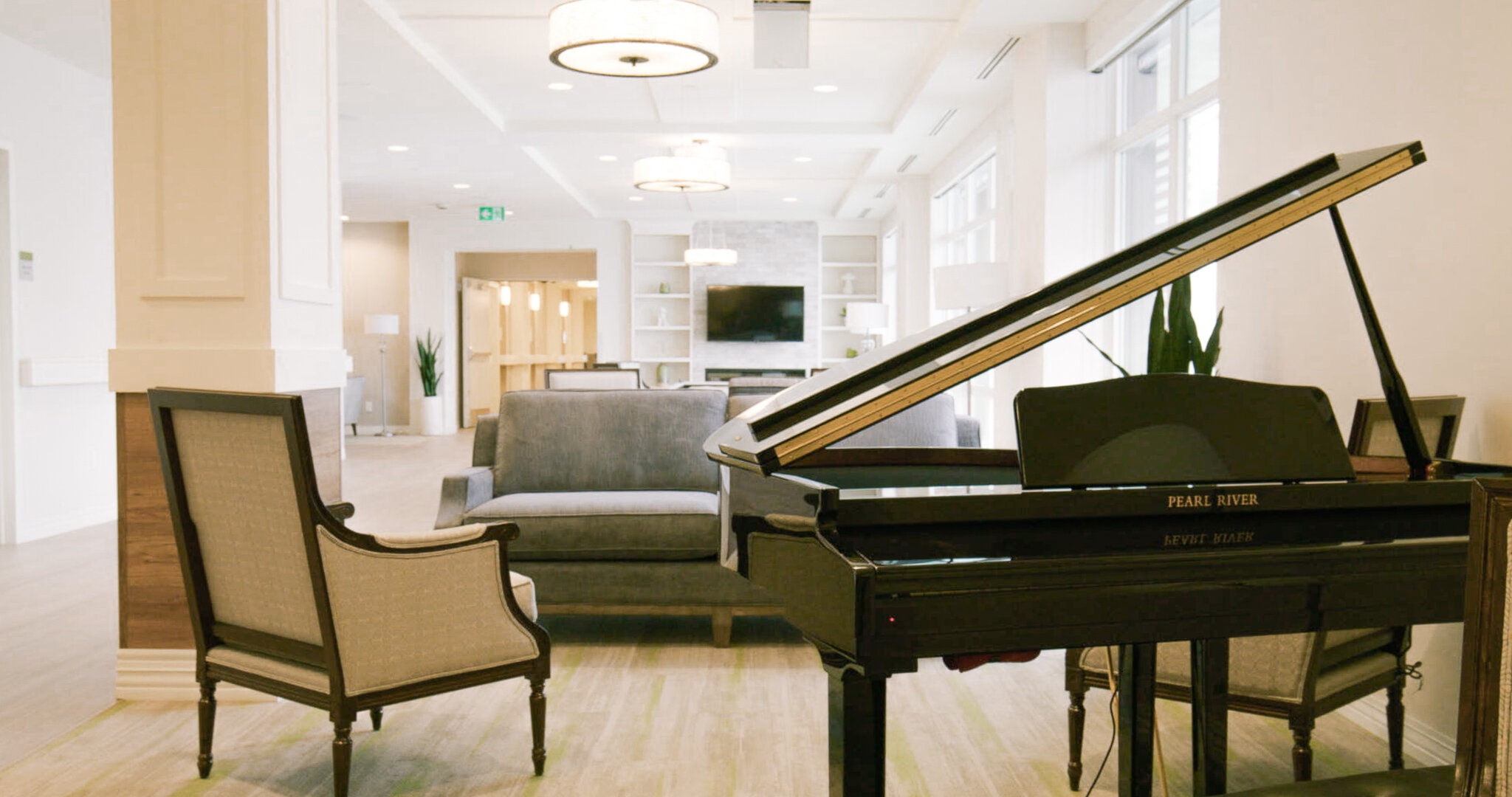 Main lobby with great piano at Aster Gardens
