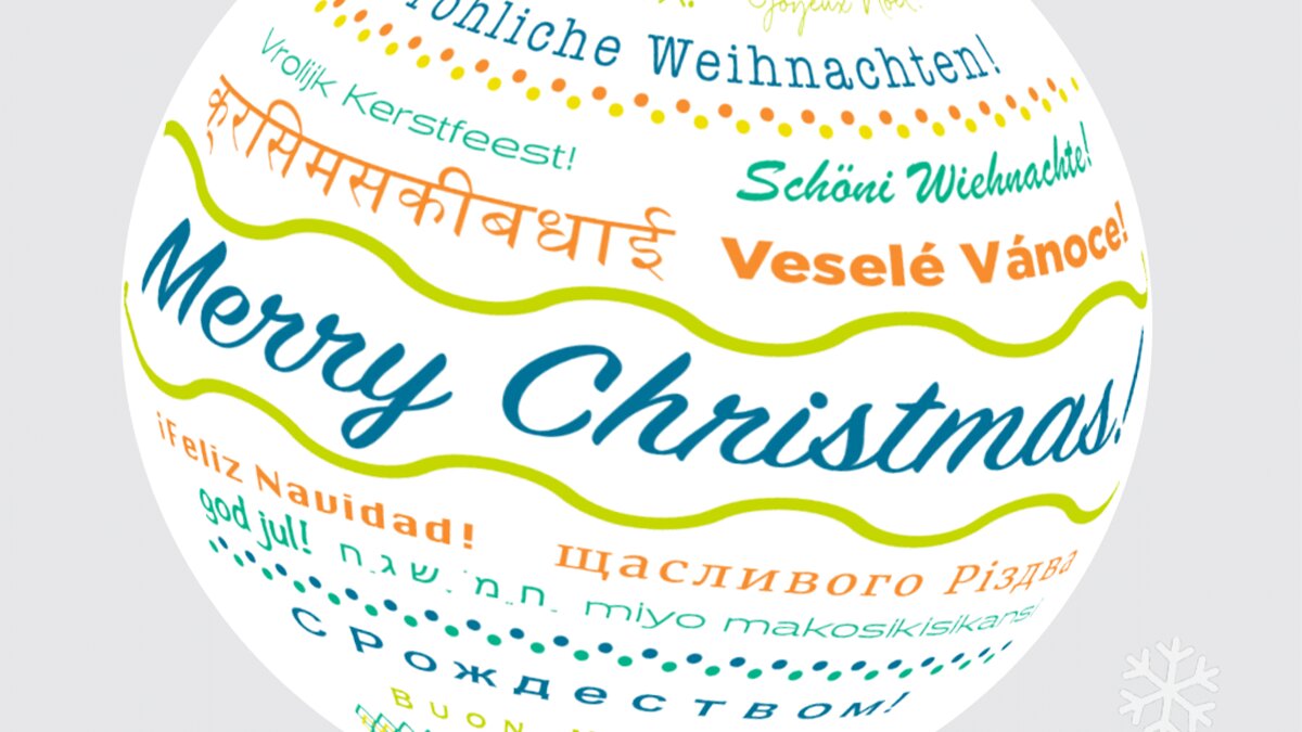 Christmas greetings in several languages are displayed on a globe-like object.