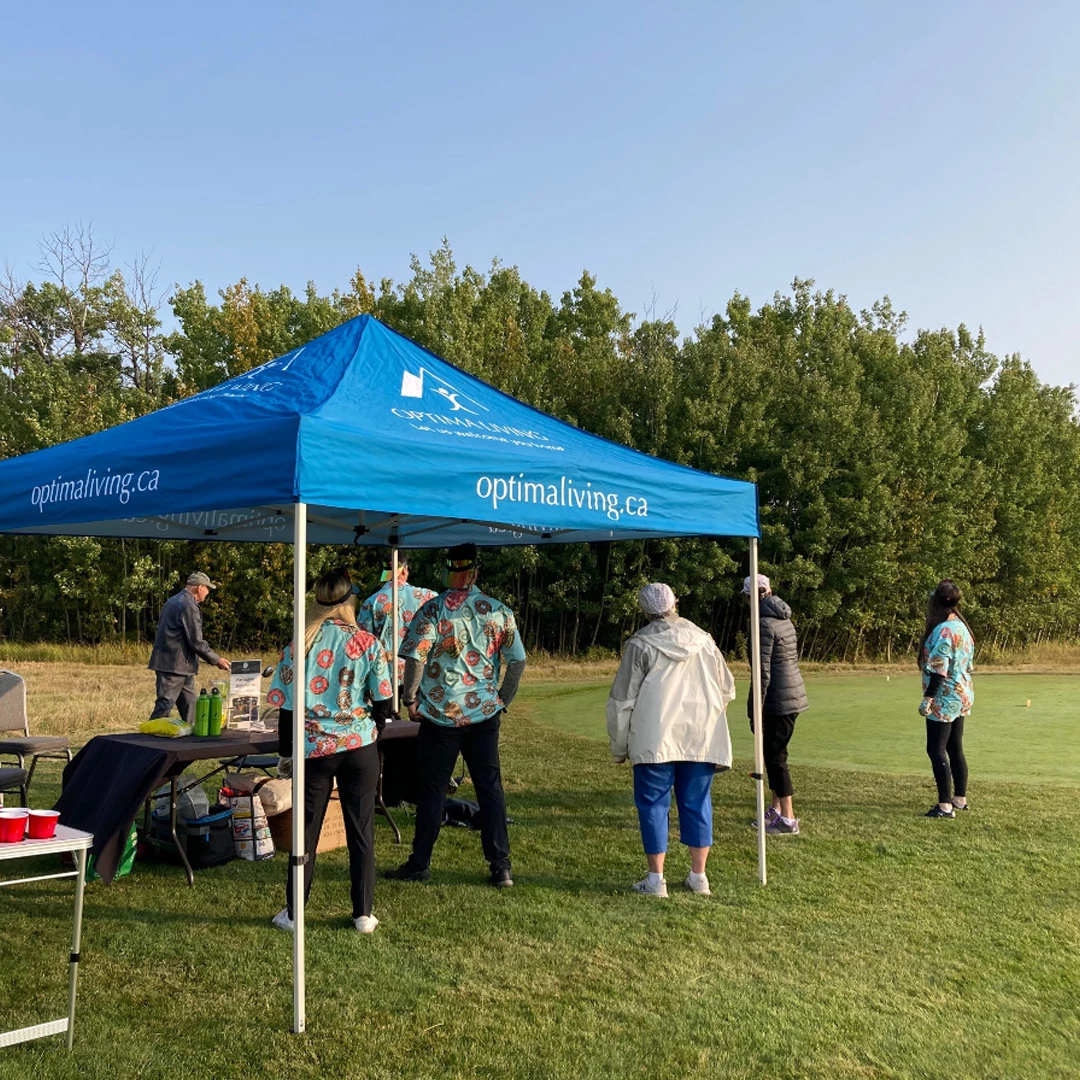 A booth of optima living on golf court