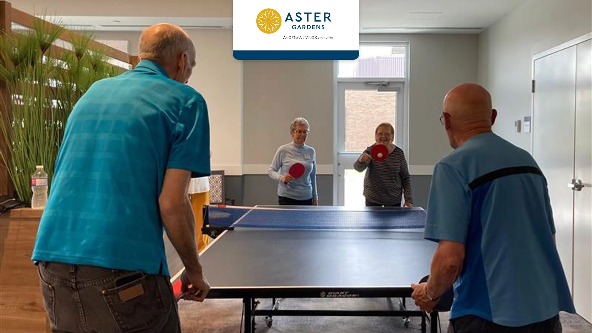 Some senior citizens playing table tennis